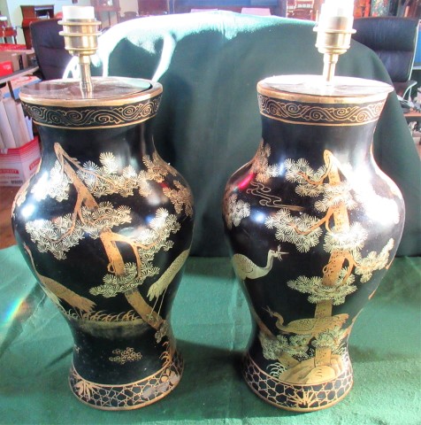 A pair of black Japanned Oriental-style baluster table lamps.