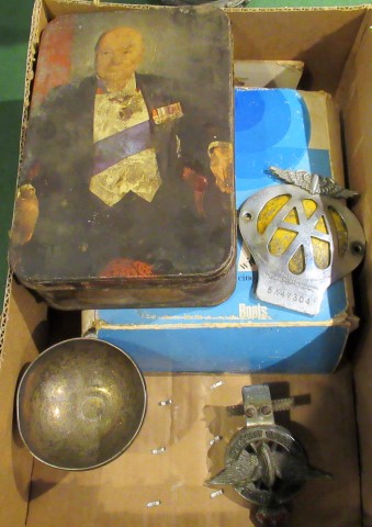 A collection of collector's items, to include: a Winston Churchill vending tin,