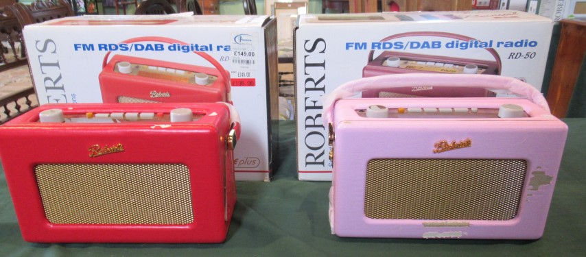 Two boxed Roberts DAB radios.