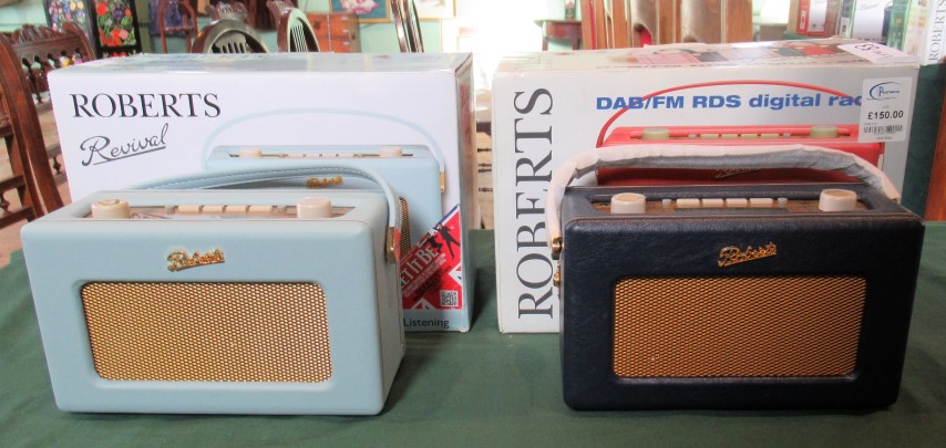 Two boxed Roberts Revival DAB radios.