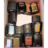 A collection of 20, mostly boxed Zippo decorative petrol cigarette lighters.