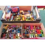 A collection of Hot Wheels and other children's die-cast model cars.