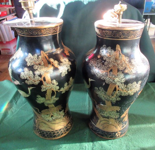 A pair of black Japanned Oriental-style baluster table lamps.