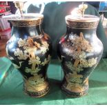 A pair of black Japanned Oriental-style baluster table lamps.