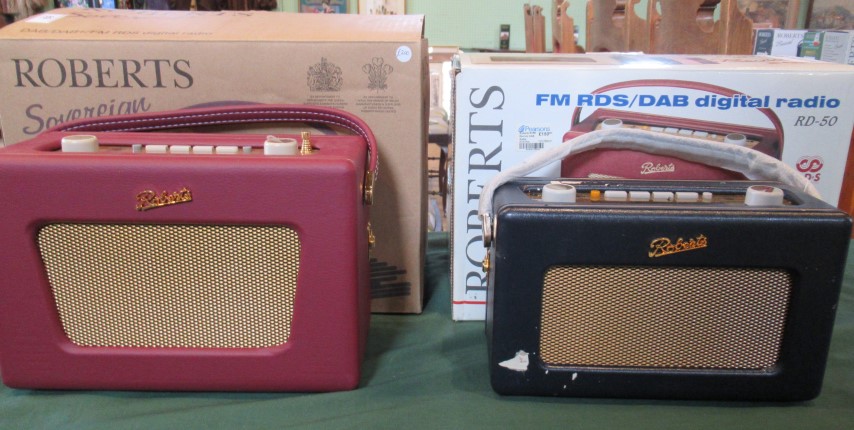 Two boxed Roberts DAB radios.
