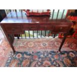 A Chinese 18th century-style teakwood scholars desk with two short frieze drawers,