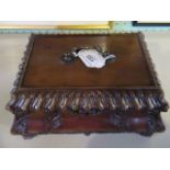 A George II-style mahogany bombe form table casket with fitted interior.