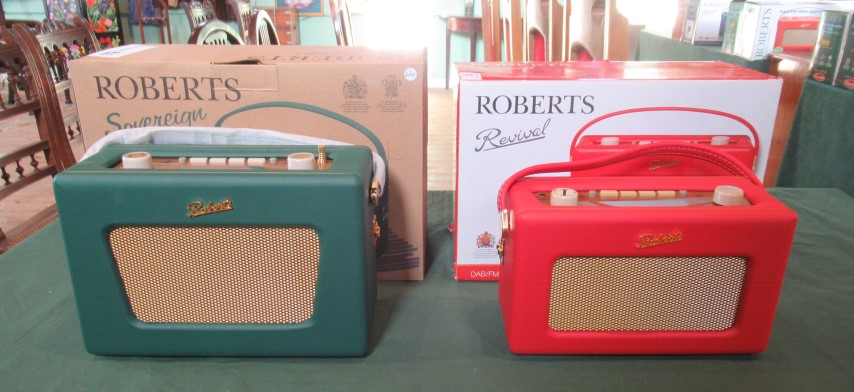 Two boxed Roberts digital radios.