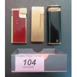 A Cartier gold plated mounted cigarette lighter,