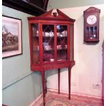 An Edwardian figured satinwood two astragal glazed door display cabinet,