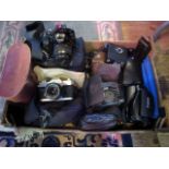 A Canon 400D digital camera, a Canon FTb 45mm camera, together with various other accessories,