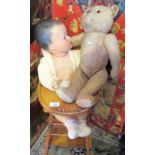 A circa 1930's Fadap teddy bear, together with a French Convert doll and a 1950's highchair,