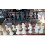 A set of cast resin Staunton pattern chessmen.