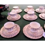 A mid-20th century Imperial bone china set of 8 teacups, saucers and tea plates,