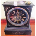 A 19th century French black slate mantle clock, with eight day movement,