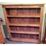 A 20th century French oak and metal bound open bookcase,