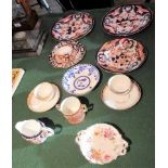 Three 19th century Derby Imari decorated plates,