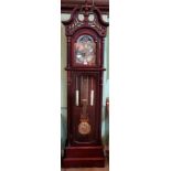 A reproduction mahogany stained longcase clock, having a 31 day movement.