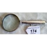 A magnifying glass with silver handle, Sheffield marks.