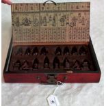 A set of 20th century Oriental resin moulded chessmen,