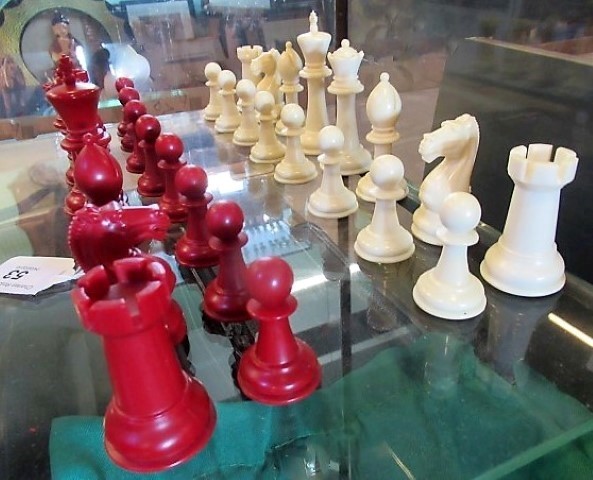 A set of white and red resin moulded chessmen. - Image 2 of 3