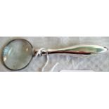 A magnifying glass with silver handle, Chester marks.