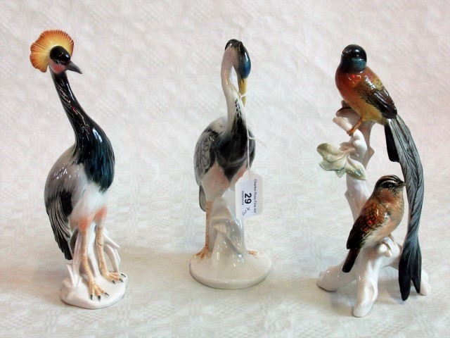 Three Karl Ens porcelain models, including Heron and two others.