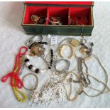 A mixed lot of costume and paste set jewellery, including: necklaces, brooches,