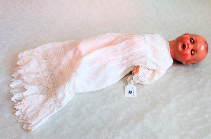 An Armand Marseille composition headed doll, 16 inch, with sleeping eyes and open mouth,