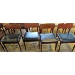 A set of late 1960's/early 1970's teak dining chairs,