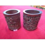 A pair of late 19th/early 20th century Chinese bamboo brush pots,