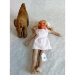 A mid-20th century Nora Wellings-type felt bodied doll with composition head dressed in Dutch