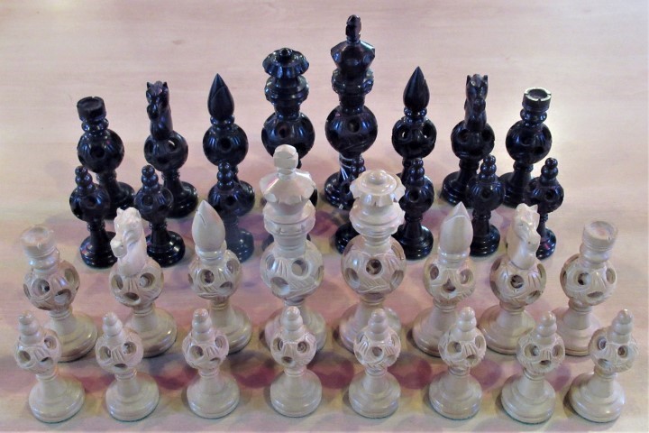 A set of carved and stained boxwood chessmen.