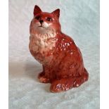 A Beswick fireside model of a seated cat with marmalade gloss coat, no. 1867.