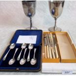 A cased set of six silver teaspoons, hallmarks for Sheffield 1911,