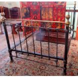 A Victorian cast iron and tubular brass double bed frame.