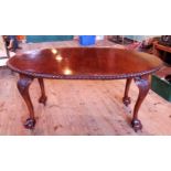 An Edwardian mahogany extending dining table,