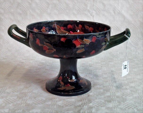 An early 20th century Moorcroft twin handled pedestal bowl,