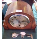 A Bravingtons oak cased mantle clock,