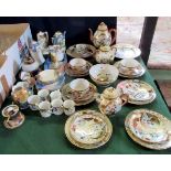 A mid-20th century Japanese porcelain part-tea service, comprising: cups, saucers, tea plates,