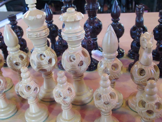 A set of carved and stained boxwood chessmen. - Image 2 of 3