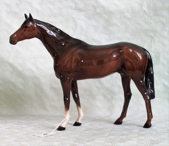 A large Beswick model of a Bay Stallion.