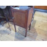 An Edwardian mahogany and boxwood strung pot cupboard.