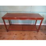 A reproduction mahogany veneered side table,