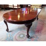 A late 19th/early 20th century mahogany D-end extending dining table,