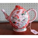 A 19th century Chinese porcelain peach form Cadogan teapot, painted in the Famille Verte palette.