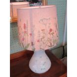 A 20th century Belleek porcelain table lamp with decorative shade.
