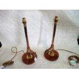 A pair of copper and brass plumbers pipe work novelty table lamps.