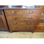An early 19th century mahogany chest, the rectangular top over four graduated long drawers,