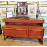 A circa 1970's McIntosh teak sideboard, the rectangular top over three frieze drawers,